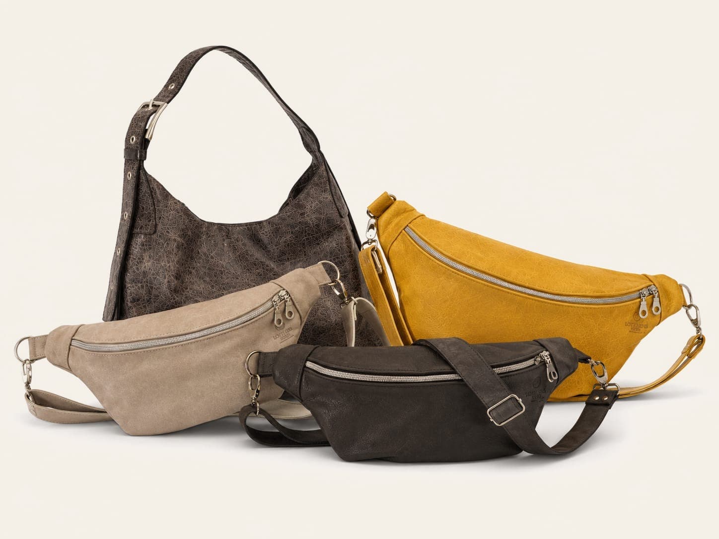 Die Kollektion von LOEFFLER SOUL: die Luna Schultertasche und die Sling in mehreren Lederfarben